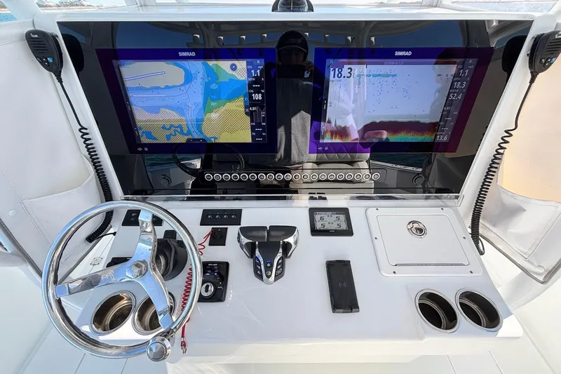  Yacht Photos Pics Control panel of a 2024 Freeman 38 boat with dual Simrad displays.
