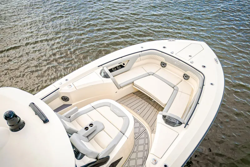 Your Next Boat! Yacht Photos Pics 2024 Scout 377 LXF boat with luxurious seating on calm water.