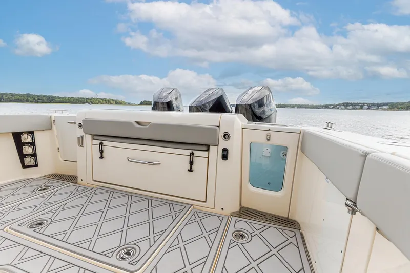 Your Next Boat! Yacht Photos Pics 2024 Scout 377 LXF boat deck with Summer Kitchen Upgrade/Slide Out Cooler/Seat