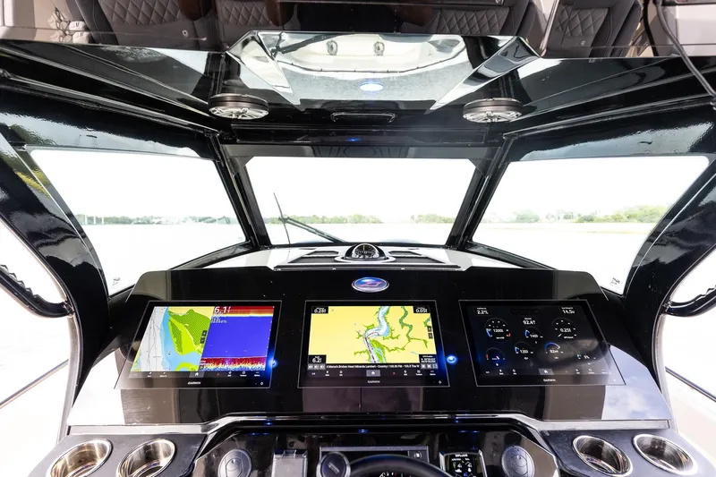Your Next Boat! Yacht Photos Pics 2024 Scout 377 LXF boat dashboard with advanced navigation displays and controls and Skylight Hatch in Hardtop