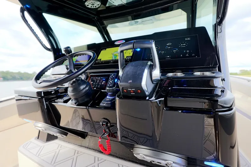 Your Next Boat! Yacht Photos Pics 2024 Scout 377 LXF boat dashboard with advanced navigation and control systems.