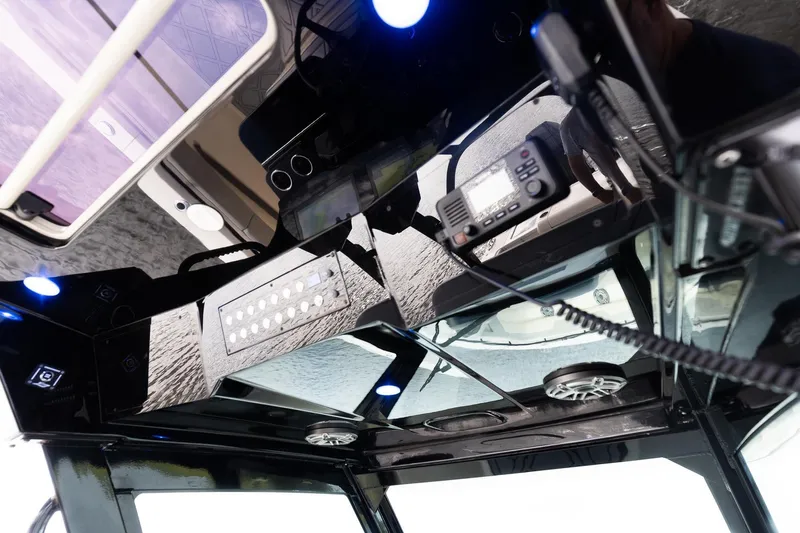 Your Next Boat! Yacht Photos Pics 2024 Scout 377 LXF Overhead Panel with switches and hatch in hardtop