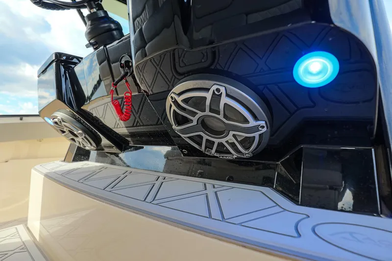 Your Next Boat! Yacht Photos Pics 2024 Scout 377 LXF boat dashboard with speakers and blue LED light.