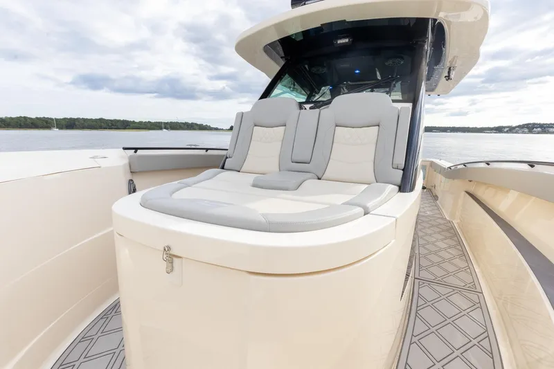 Your Next Boat! Yacht Photos Pics 2024 Scout 377 LXF luxury Sunpad forward of Console with Storage Below