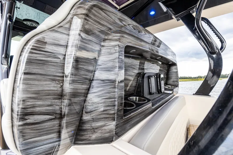 Your Next Boat! Yacht Photos Pics 2024 Scout 377 LXF Custom Paint Upgrade on back of Helm Seat plus Cell Phone Charging Docks (2)