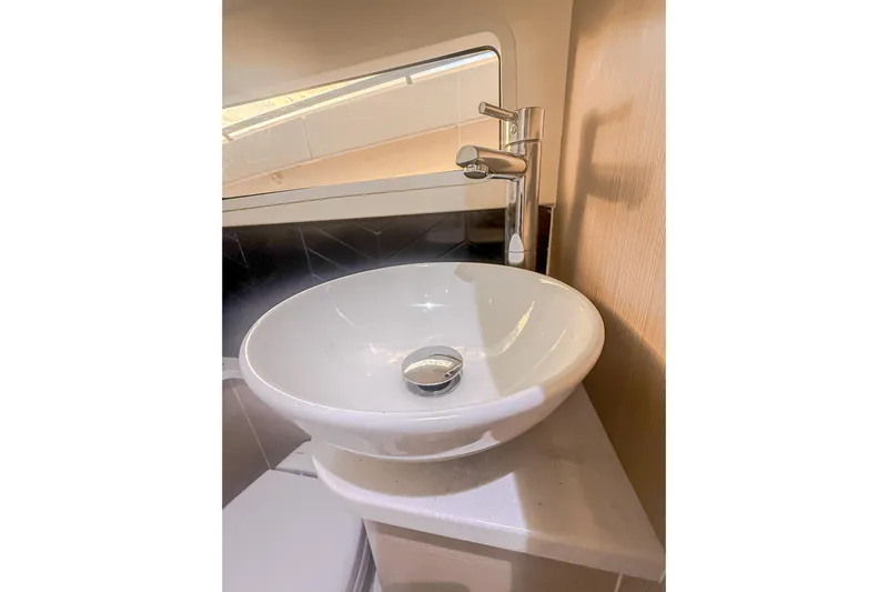 Your Next Boat! Yacht Photos Pics Modern sink and faucet in 2024 Scout 377 LXF boat interior.