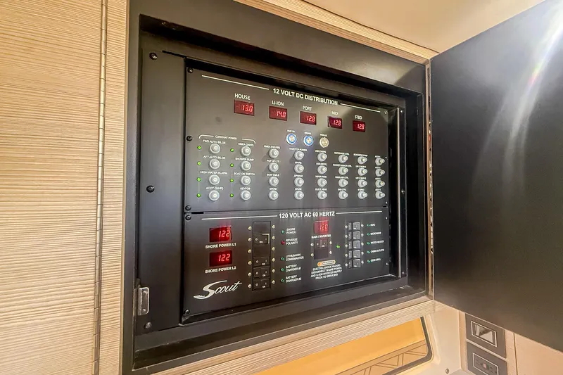 Your Next Boat! Yacht Photos Pics Electrical control panel of 2024 Scout 377 LXF boat, showcasing power distribution.