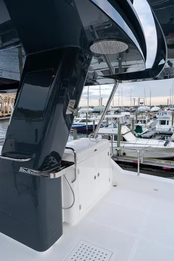 New 2024 Sirena 58 Yacht Photos Pics 2024 Sirena 58 Flybridge yacht docked at marina, showcasing sleek design and modern features.