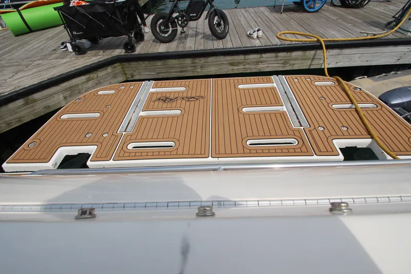  Yacht Photos Pics 1998 Sea Ray 500 Sundancer swim platform at dock with wooden deck.