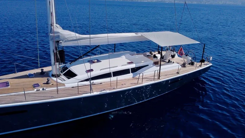 Touché Yacht Photos Pics Luxurious 2010 Windseeker Raised Pilot Saloon yacht sailing on calm blue waters.