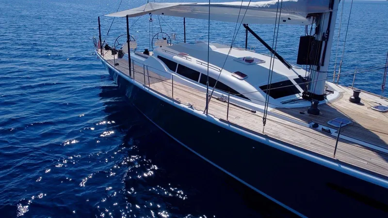 Touché Yacht Photos Pics Sailing yacht Windseeker Raised Pilot Saloon 2010 on calm blue ocean waters.