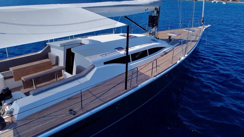 Touché Yacht Photos Pics Luxury Windseeker Raised Pilot Saloon yacht, 2010 model, sailing on clear blue waters.