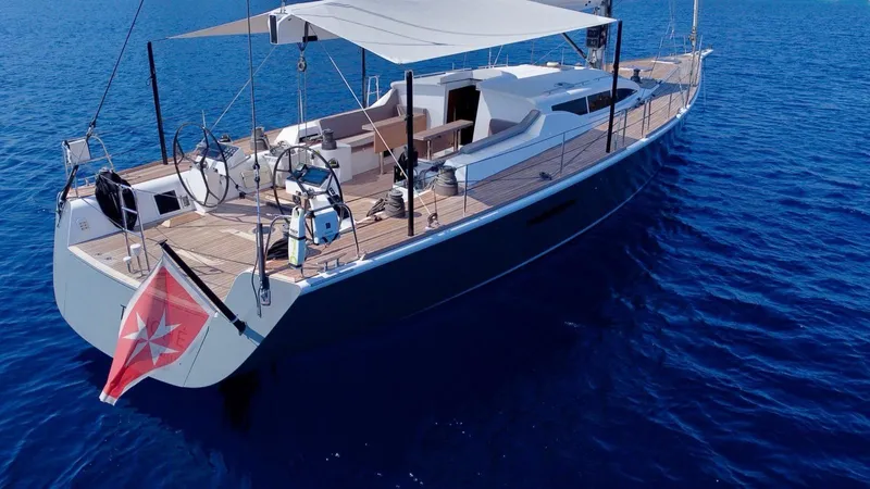 Touché Yacht Photos Pics Sleek 2010 Windseeker Raised Pilot Saloon yacht sailing on calm blue waters.