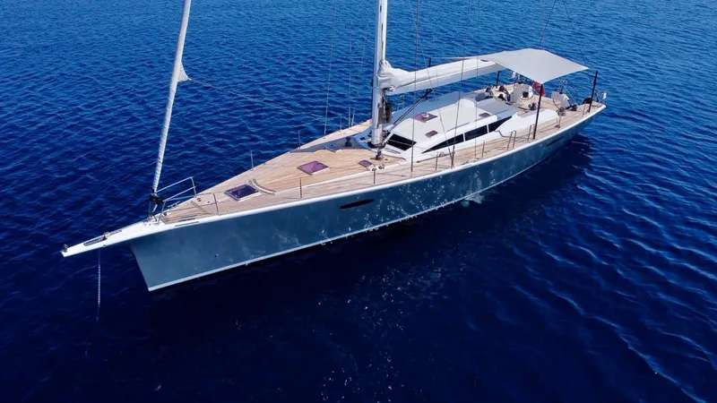 Touché Yacht Photos Pics Luxurious 2010 Windseeker Raised Pilot Saloon yacht sailing on calm blue waters.