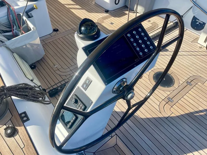 Touché Yacht Photos Pics Steering wheel and navigation panel on 2010 Windseeker Raised Pilot Saloon yacht.