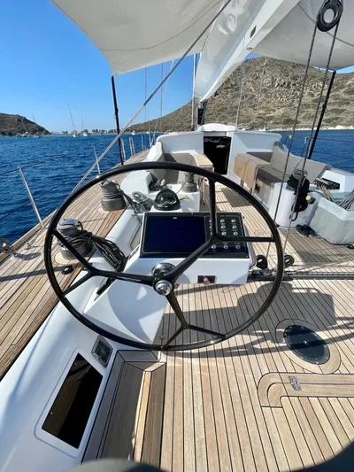 Touché Yacht Photos Pics 2010 Windseeker Raised Pilot Saloon yacht with sleek deck and modern steering wheel.