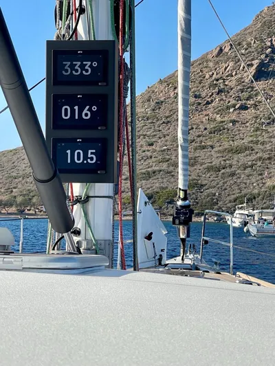 Touché Yacht Photos Pics Windseeker Raised Pilot Saloon 2010 sailboat with navigation instruments, coastal background.