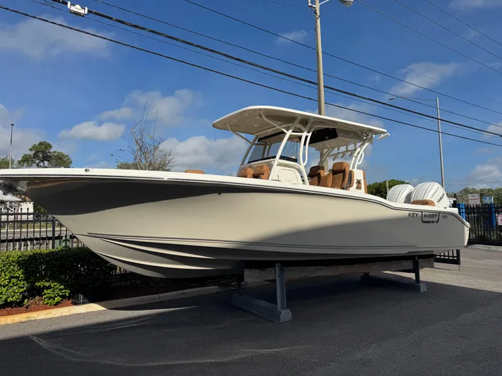  Yacht Photos Pics 2025 Key West 291 FS boat displayed outdoors on a sunny day.