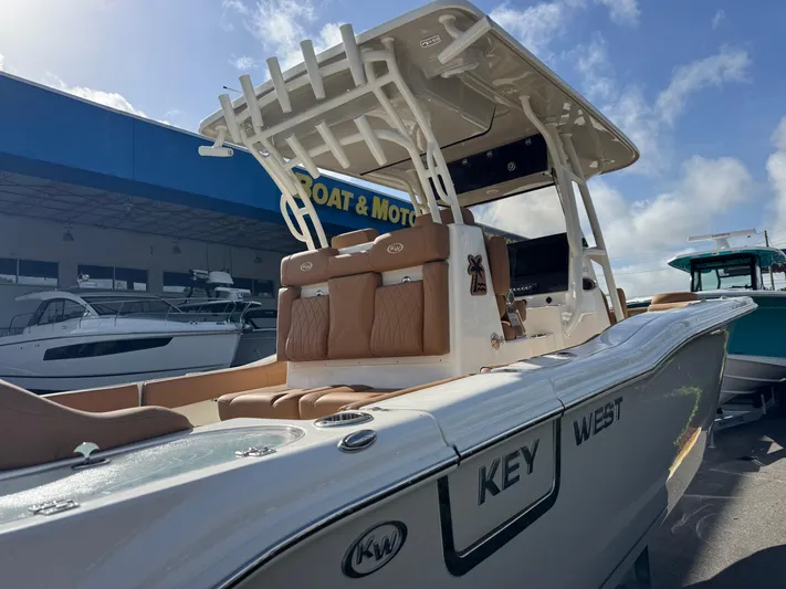  Yacht Photos Pics 2025 Key West 291 FS boat at marina, featuring sleek design and comfortable seating.