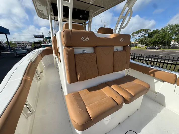  Yacht Photos Pics 2025 Key West 291 FS boat with tan seating and sleek design.