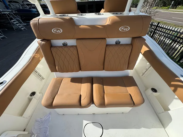  Yacht Photos Pics 2025 Key West 291 FS boat with tan leather seating and KW logo.