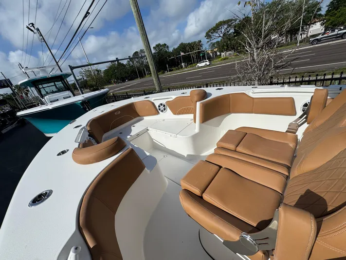  Yacht Photos Pics 2025 Key West 291 FS boat with tan seating and spacious deck.