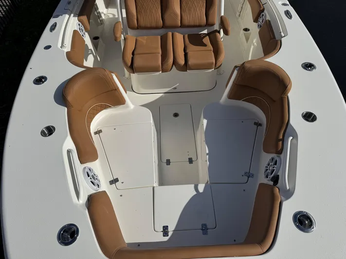  Yacht Photos Pics 2025 Key West 291 FS boat interior with tan seating and white deck.