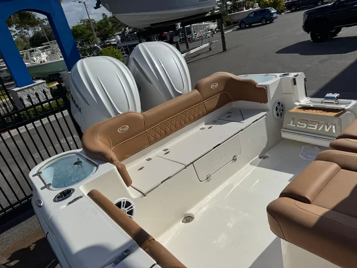  Yacht Photos Pics 2025 Key West 291 FS boat interior with tan seating and dual engines.