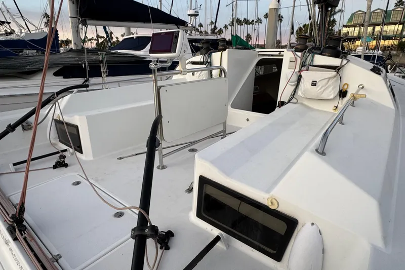 Expresso Yacht Photos Pics 2019 Pogo 36 sailboat deck with navigation equipment and moored surroundings.