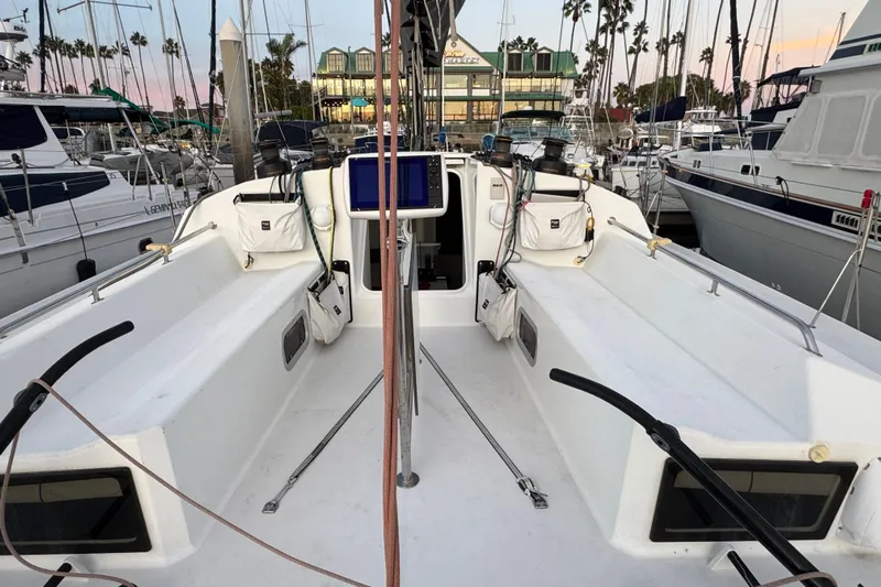 Expresso Yacht Photos Pics Sailboat cockpit of 2019 Pogo 36 docked at marina with surrounding yachts.