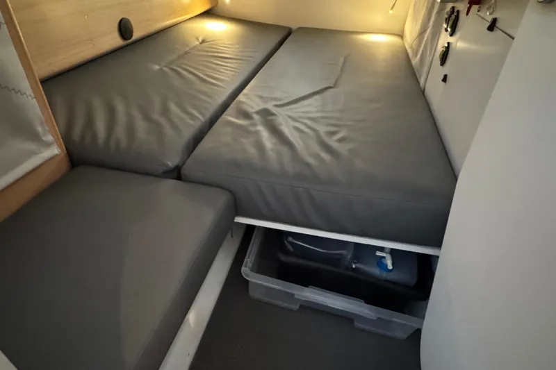 Expresso Yacht Photos Pics Compact sleeping area in 2019 Pogo 36 sailboat with storage underneath.