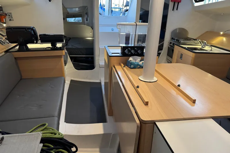 Expresso Yacht Photos Pics Interior of a 2019 Pogo 36 sailboat with modern furnishings and navigation equipment.