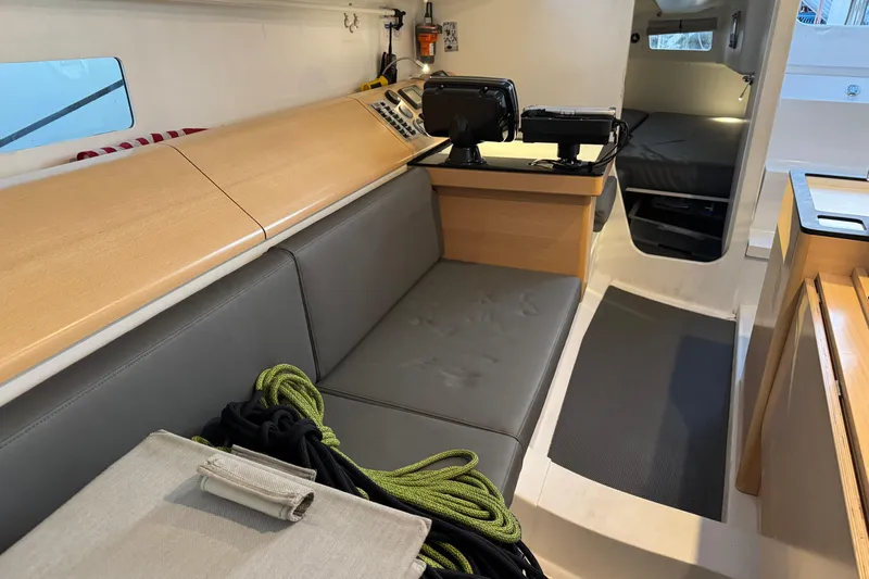 Expresso Yacht Photos Pics Interior of 2019 Pogo 36 sailboat with seating, navigation equipment, and storage.
