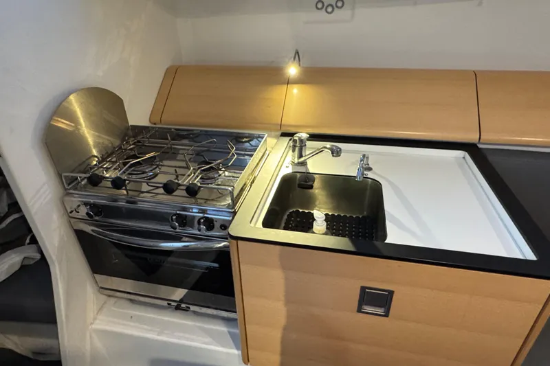 Expresso Yacht Photos Pics Compact kitchen in 2019 Pogo 36 yacht with stove and sink.