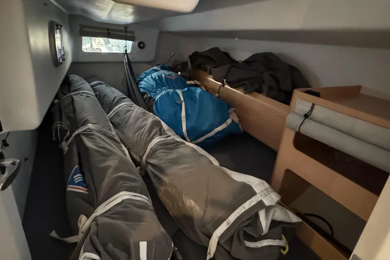 Expresso Yacht Photos Pics Interior of 2019 Pogo 36 sailboat with stored sails and equipment.