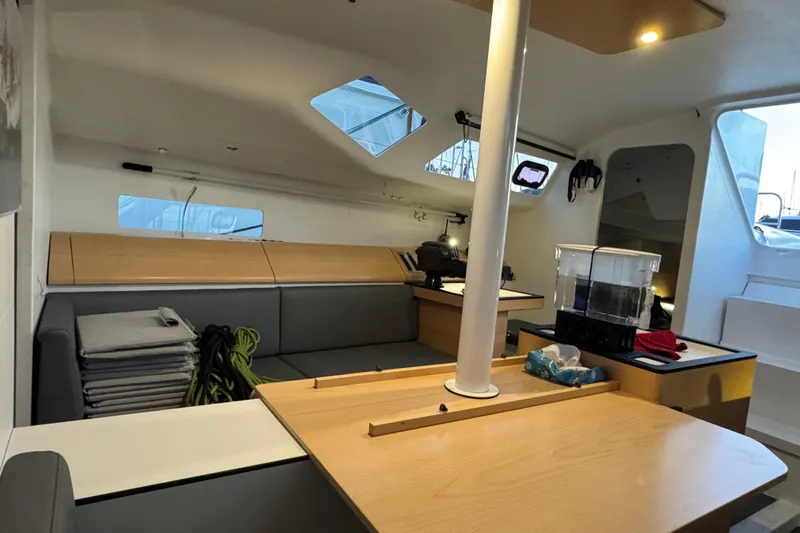 Expresso Yacht Photos Pics Interior of a 2019 Pogo 36 sailboat, featuring a modern dining area and seating.