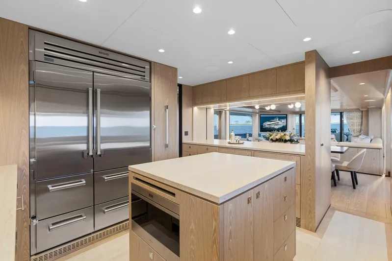Horizon Fd100-914 / Available Flibs 2025 Yacht Photos Pics Luxurious yacht kitchen interior with modern appliances, Horizon FD100, 2026 model.