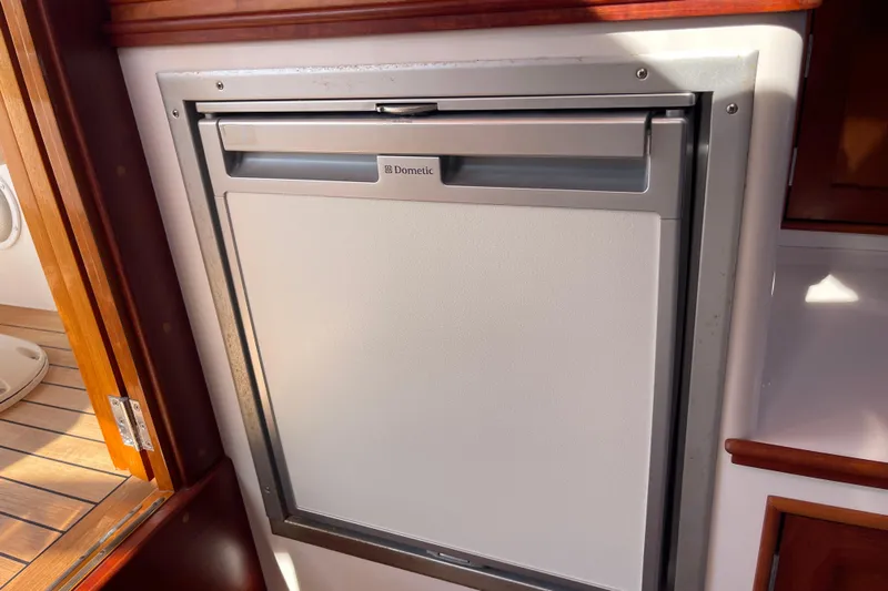 Sea Glass Yacht Photos Pics Dometic refrigerator on 2015 CH Marine Shelter Island Runabout boat interior.