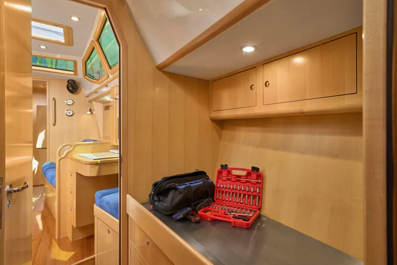 Cinchona Yacht Photos Pics Interior of 2020 Outbound 52 yacht with toolset and storage cabinets.