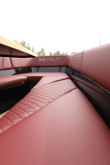  Yacht Photos Pics Luxurious red seating in 2023 Revolt Comfort 47 boat interior.