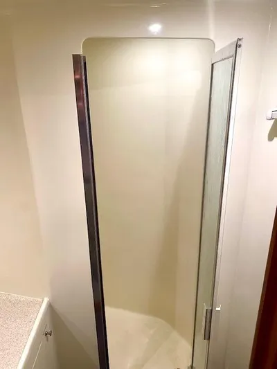 Woodcutter Yacht Photos Pics Shower area in 2000 Custom Carolina 56 East Bay yacht bathroom.