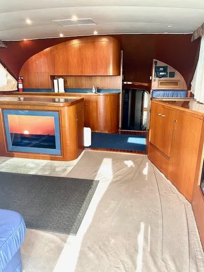 Woodcutter Yacht Photos Pics Interior of 2000 Custom Carolina 56 East Bay yacht with wooden cabinetry and modern design.
