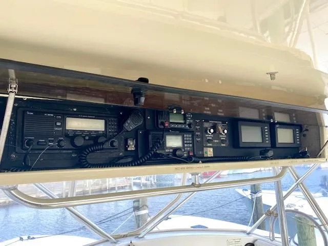 Woodcutter Yacht Photos Pics Custom Carolina 56 East Bay 2000 boat dashboard with navigation and communication equipment.