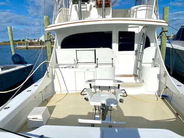 Woodcutter Yacht Photos Pics Custom Carolina 56 East Bay 2000 yacht deck with fishing chair and equipment.