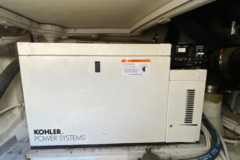 Slippin Out Yacht Photos Pics Kohler power system in 2004 Carver 36 Super Sport yacht engine room.