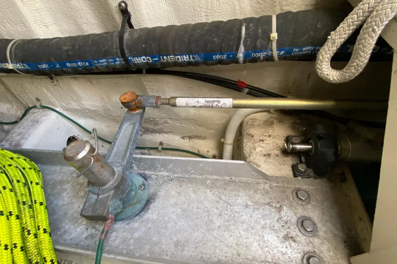 Slippin Out Yacht Photos Pics Engine compartment of a 2004 Carver 36 Super Sport boat, showing mechanical components.