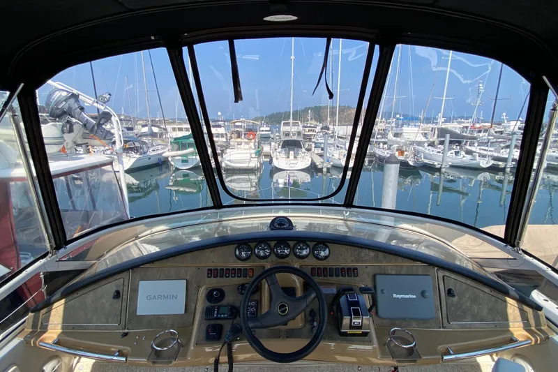 Slippin Out Yacht Photos Pics Cockpit view of 2004 Carver 36 Super Sport yacht in marina.