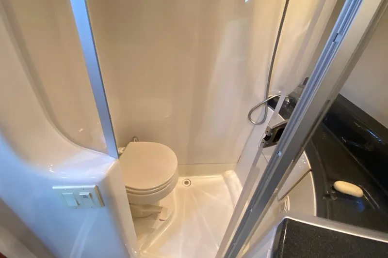 Slippin Out Yacht Photos Pics 2004 Carver 36 Super Sport bathroom with shower and toilet.