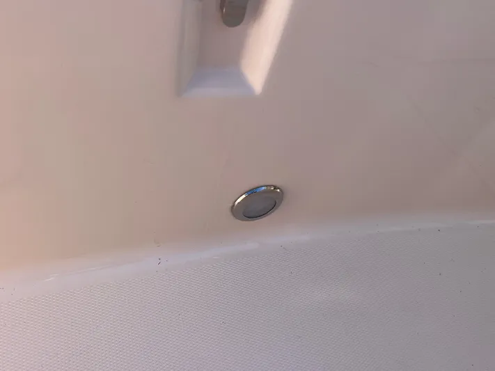  Yacht Photos Pics 2023 Grady-White Freedom 275 boat interior detail with chrome fixture.