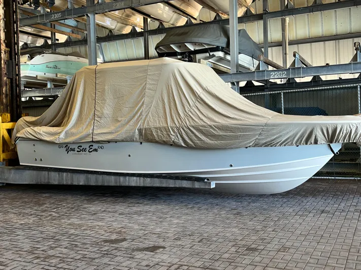  Yacht Photos Pics 2023 Grady-White Freedom 275 boat covered in storage, Longboat Key, FL.